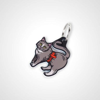Tournicat cast acrylic keychain with double coil keyring. Shown on white background.
