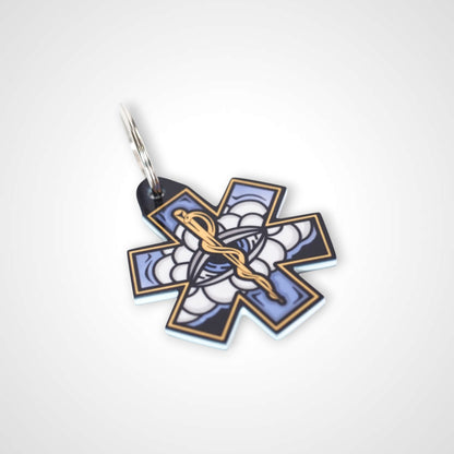 White Cloud cast acrylic keychain with double coil keyring. Shown on white background.