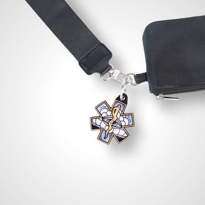 White Cloud cast acrylic keychain with double coil keyring. Shown on wallet.