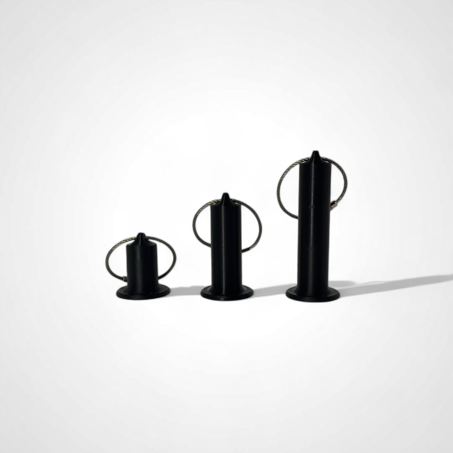 a compact black roll holder to hold and tape and coban for EMS, paramedics, EMT's, nurses, flightmed, vetmed, and athletic trainers