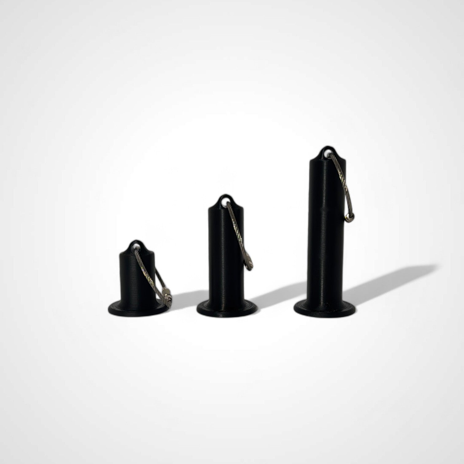 a compact black roll holder to hold and tape and coban for EMS, paramedics, EMT's, nurses, flightmed, vetmed, and athletic trainers