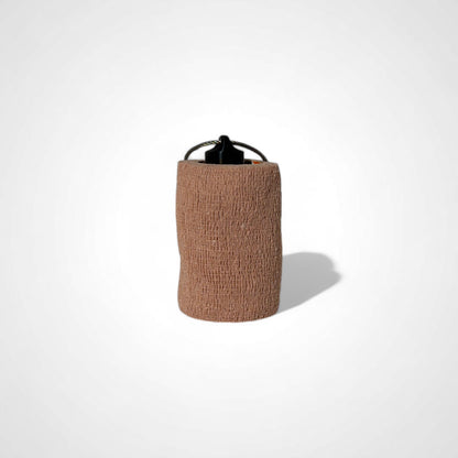 a compact black roll holder 3 inches tall to hold and tape and coban for EMS, paramedics, EMT's, nurses, flightmed, vetmed, and athletic trainers