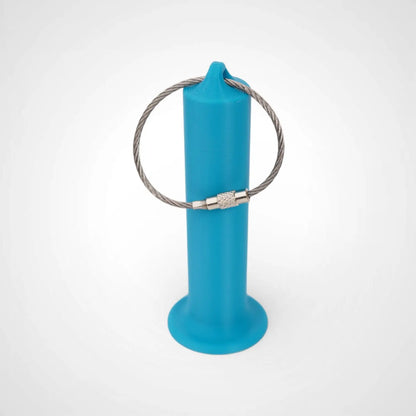 a compact utility keychain called a blue roll holder 3 inches tall to hold and tape transpore tape cohesive bandage coban and bangade rolls for EMS, paramedics, EMT's, nurses, flightmed, vetmed, and athletic trainers