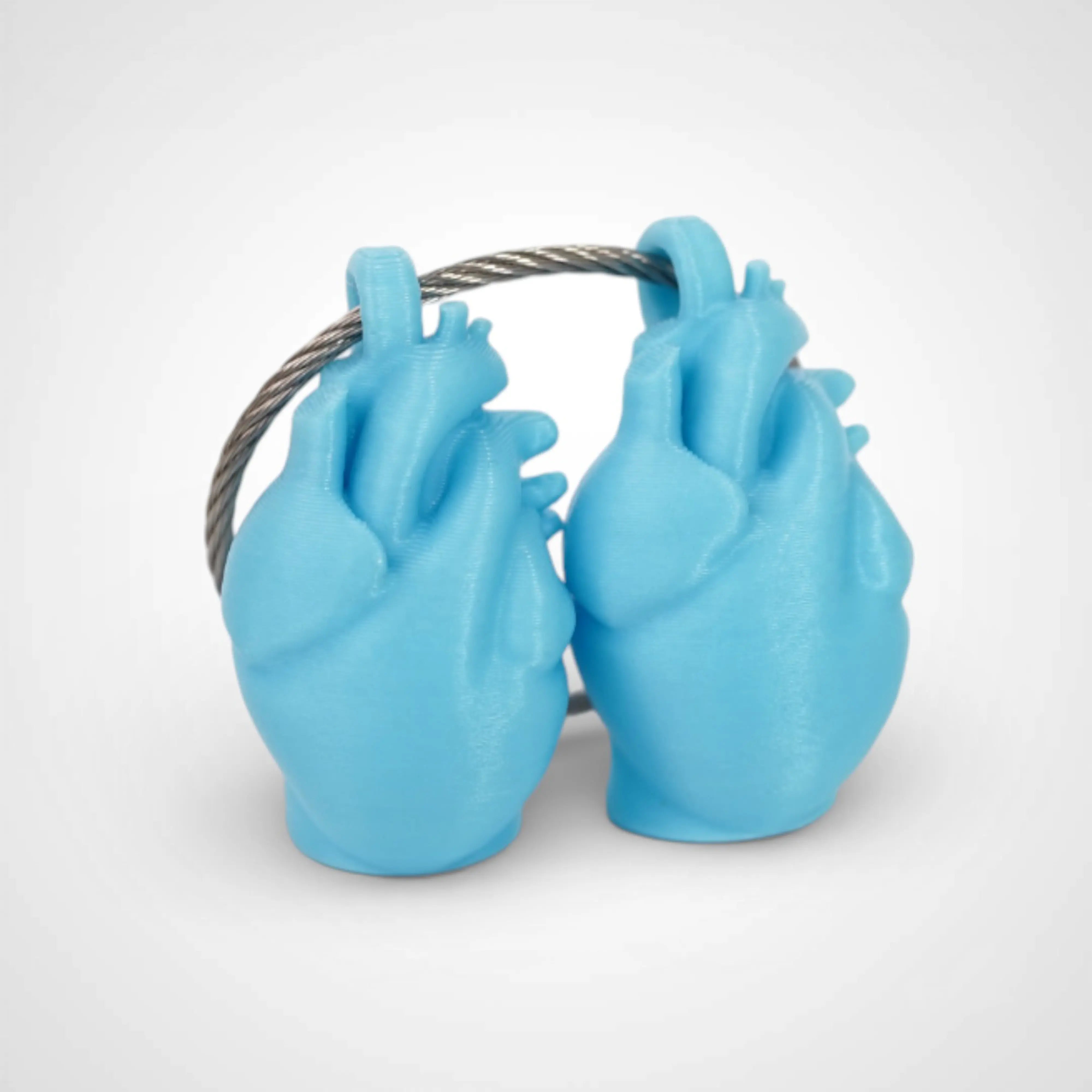 Blue Glow Teal Anatomical Heart Cap Clip 2-pack - Rescue Candy