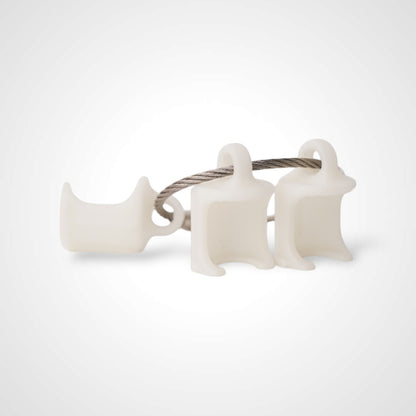 Three white polylactic acid created using additive manufacturing faux flush cap clips on steel cable keyring. Shown on a white background.