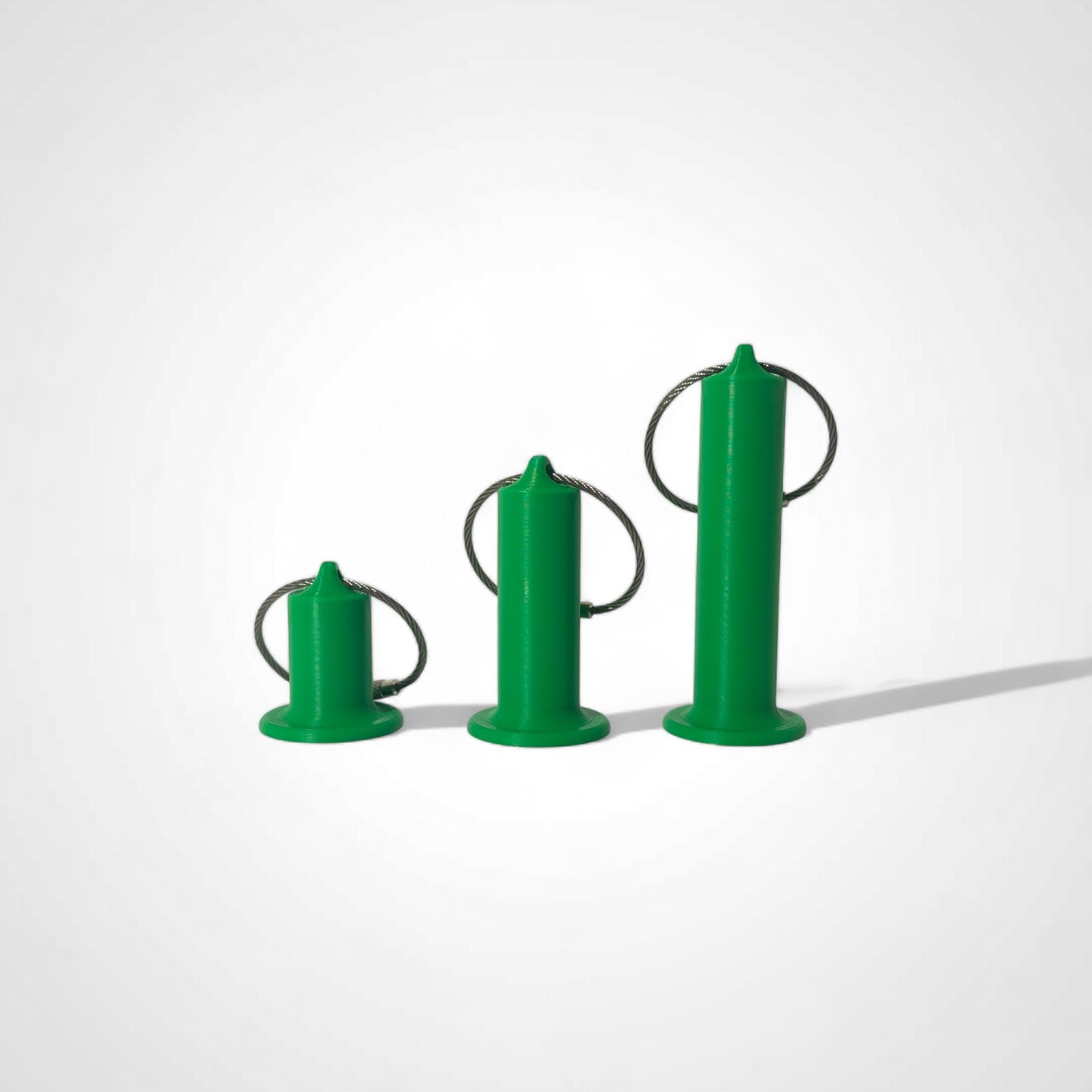 a compact green roll holder to hold and tape and coban for EMS, paramedics, EMT's, nurses, flightmed, vetmed, and athletic trainers