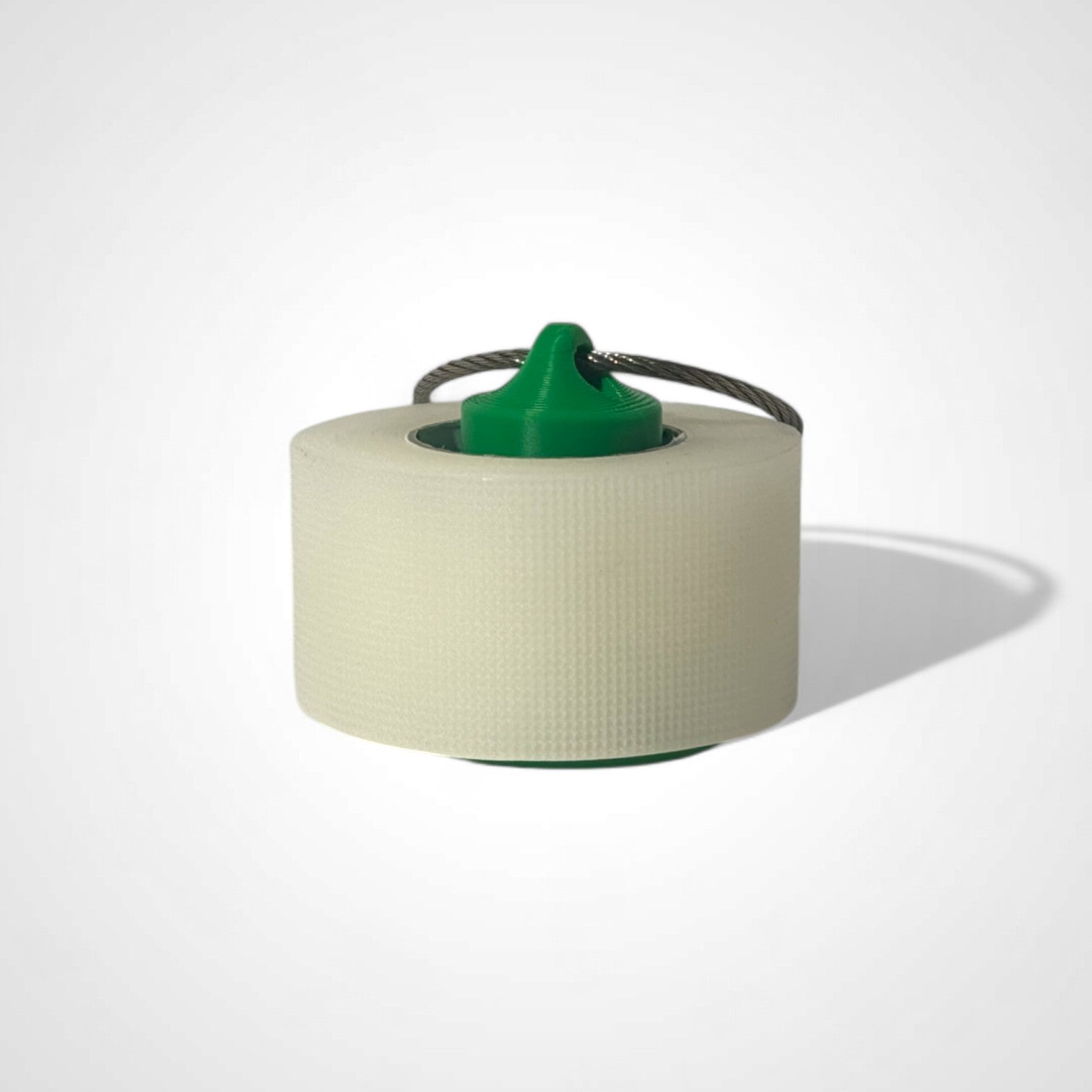 a compact green roll holder 1 inch tall to hold and tape and coban for EMS, paramedics, EMT's, nurses, flightmed, vetmed, and athletic trainers