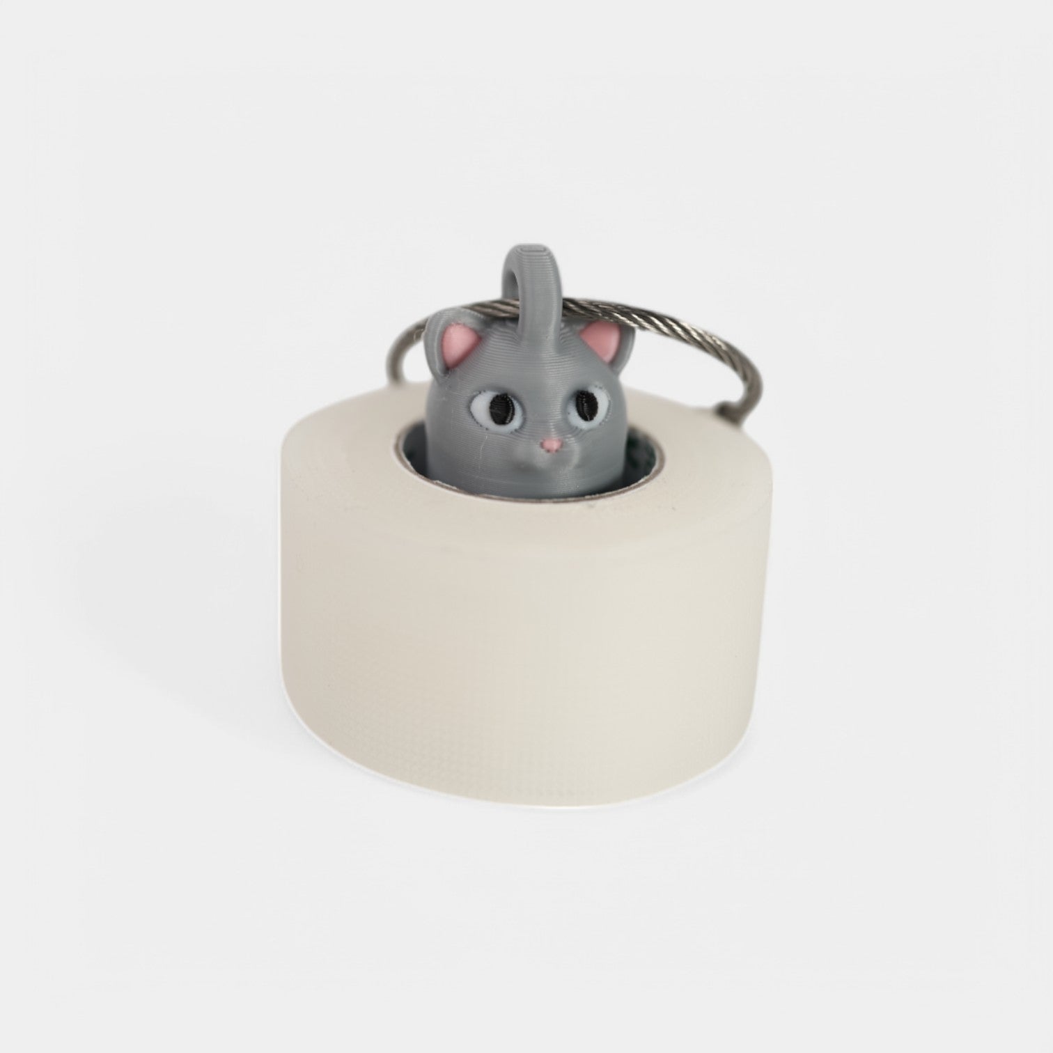 a compact grey cat roll holder to hold and tape and coban for EMS, paramedics, EMT's, nurses, flightmed, vetmed, and athletic trainers