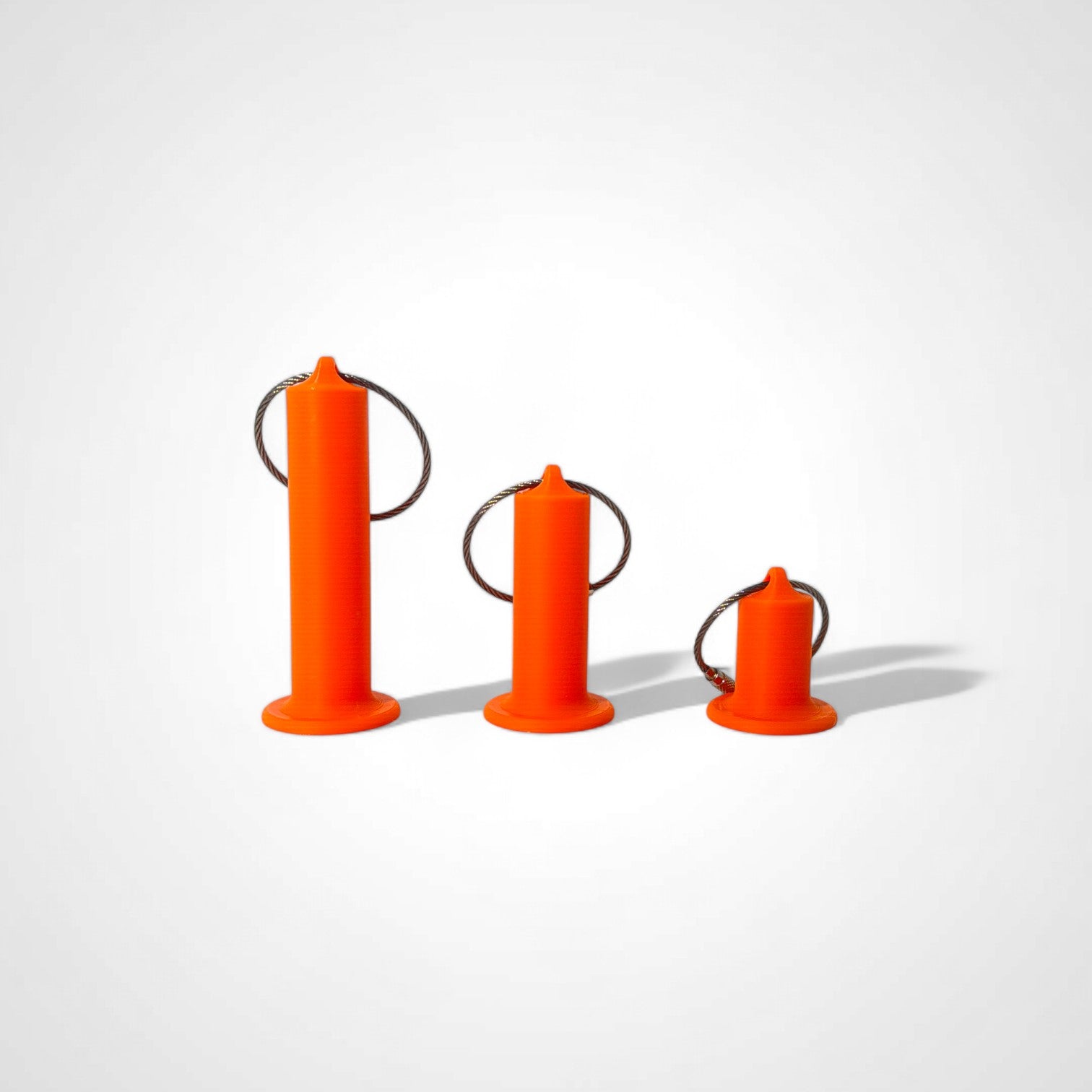 a compact orange roll holder to hold and tape and coban for EMS, paramedics, EMT's, nurses, flightmed, vetmed, and athletic trainers