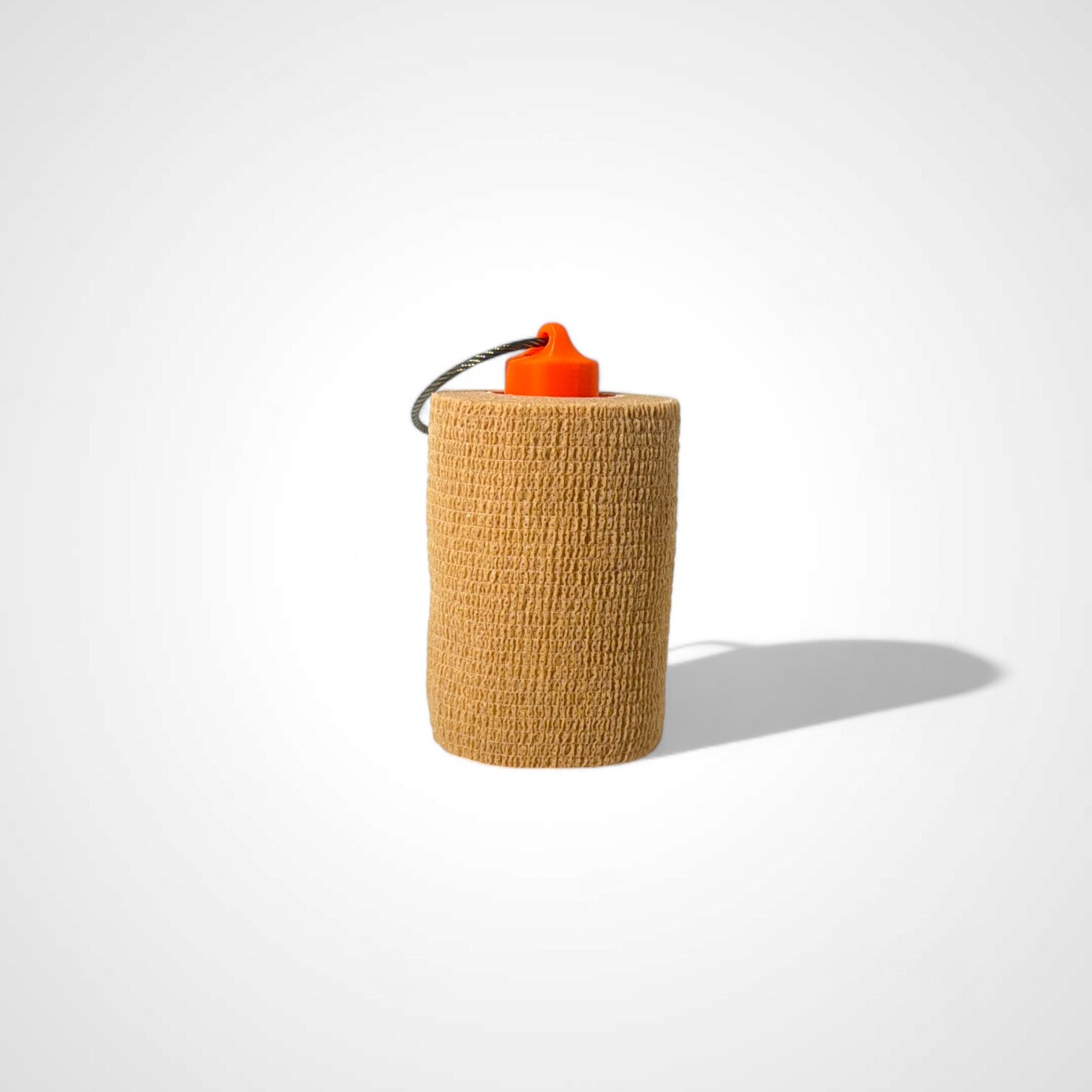 a compact orange roll holder 3 inches tall to hold and tape and coban for EMS, paramedics, EMT's, nurses, flightmed, vetmed, and athletic trainers