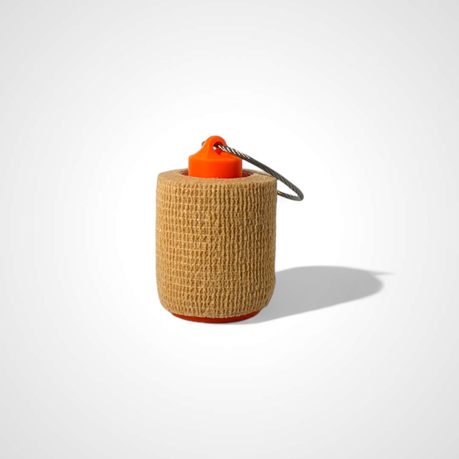 a compact orange roll holder 2 inches tall to hold and tape and coban for EMS, paramedics, EMT's, nurses, flightmed, vetmed, and athletic trainers