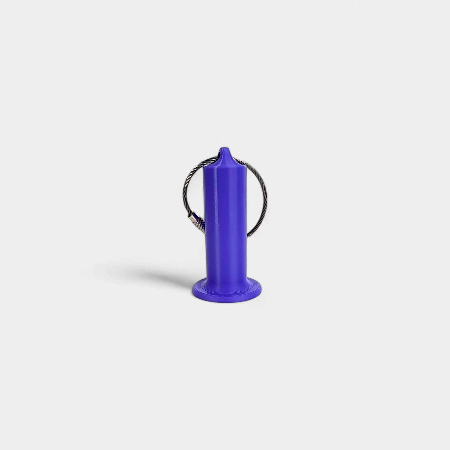 a compact purple roll holder 2 inches tall to hold and tape and coban for EMS, paramedics, EMT's, nurses, flightmed, vetmed, and athletic trainers