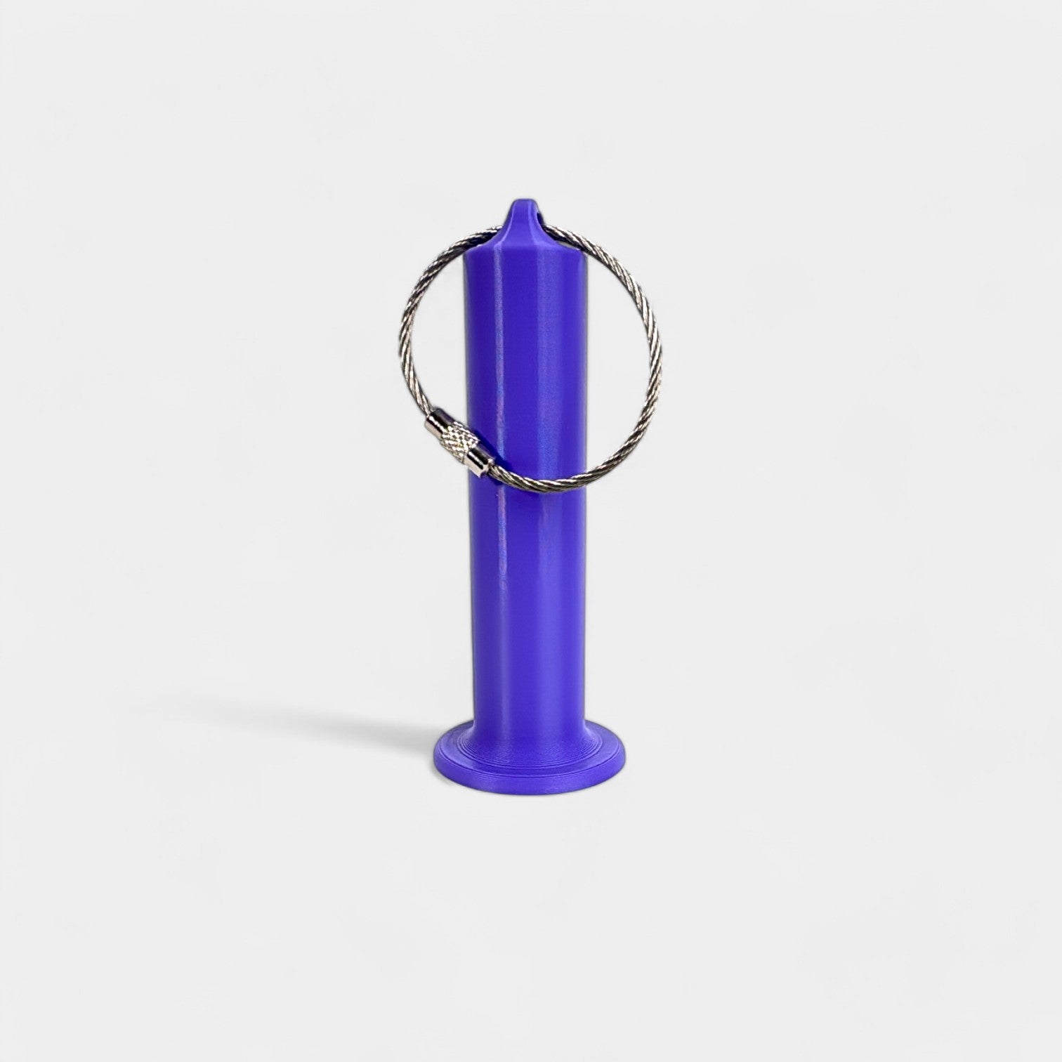 a compact purple roll holder 3 inches tall to hold and tape and coban for EMS, paramedics, EMT's, nurses, flightmed, vetmed, and athletic trainers