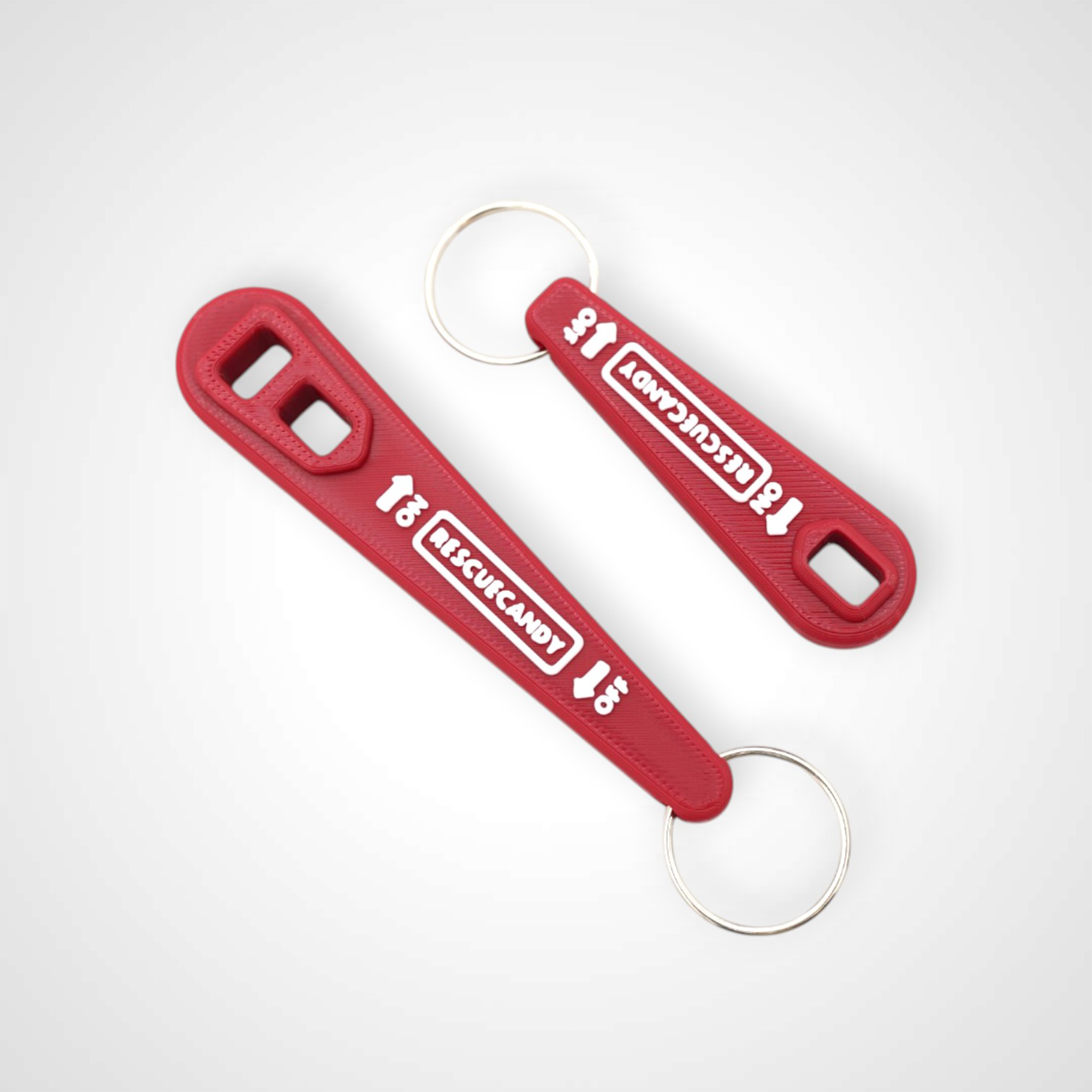 Full and mini red Oxygen Wrench. Made to fit CGA-870 valves. Shown on white background.