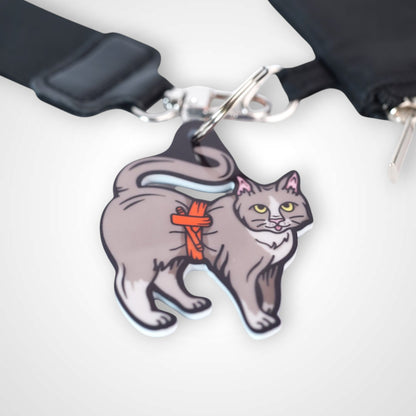 Tournicat cast acrylic keychain with double coil keyring. Shown on wallet.