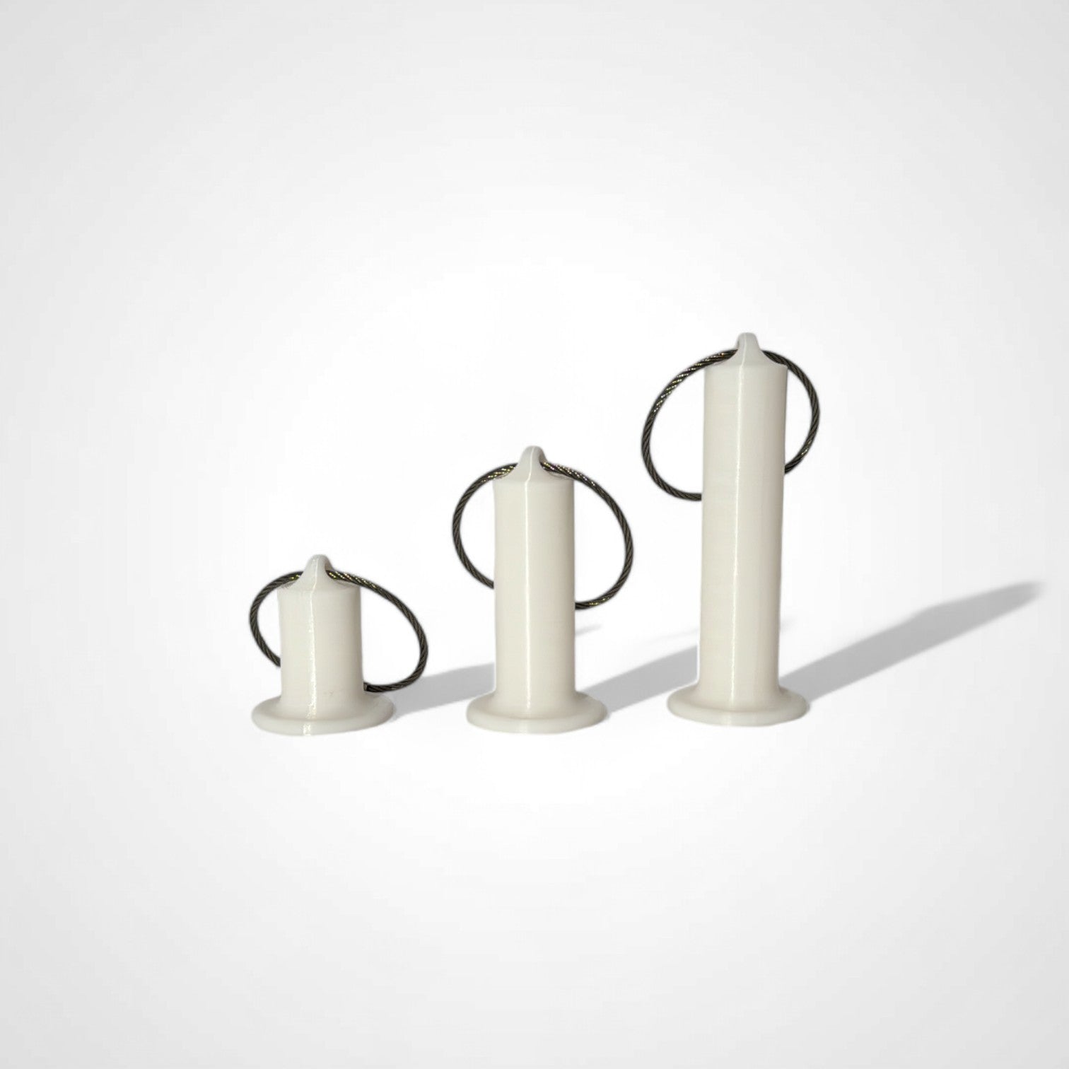 a compact white roll holder to hold and tape and coban for EMS, paramedics, EMT's, nurses, flightmed, vetmed, and athletic trainers
