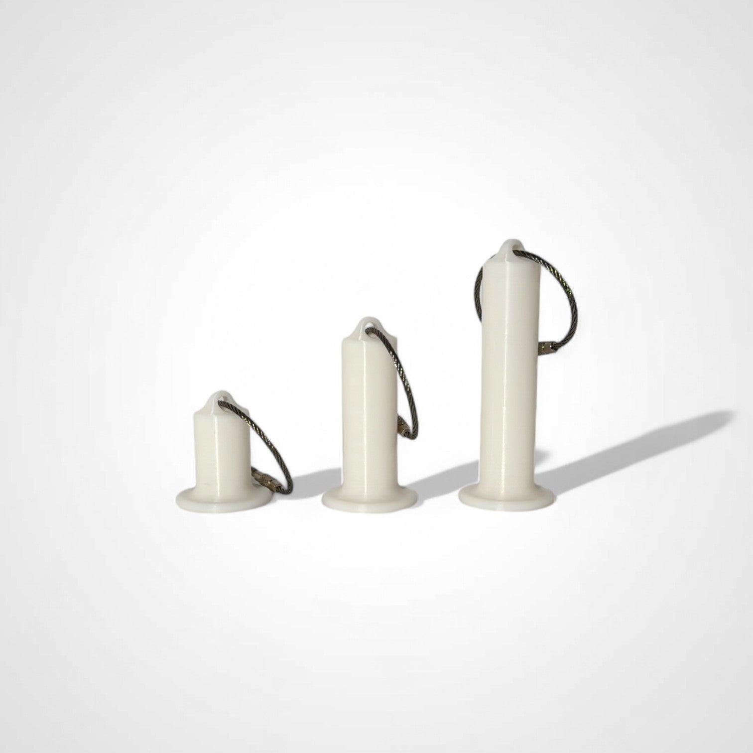 a compact white roll holder to hold and tape and coban for EMS, paramedics, EMT's, nurses, flightmed, vetmed, and athletic trainers