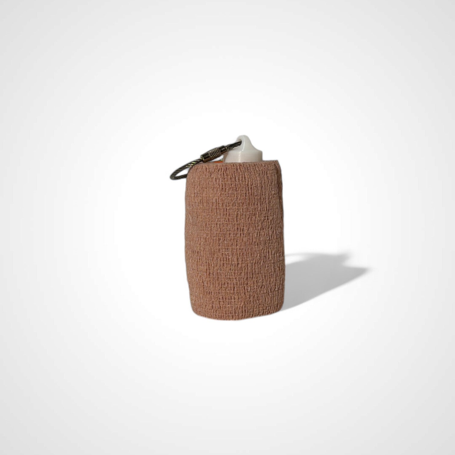 a compact white roll holder 3 inches tall to hold and tape and coban for EMS, paramedics, EMT's, nurses, flightmed, vetmed, and athletic trainers