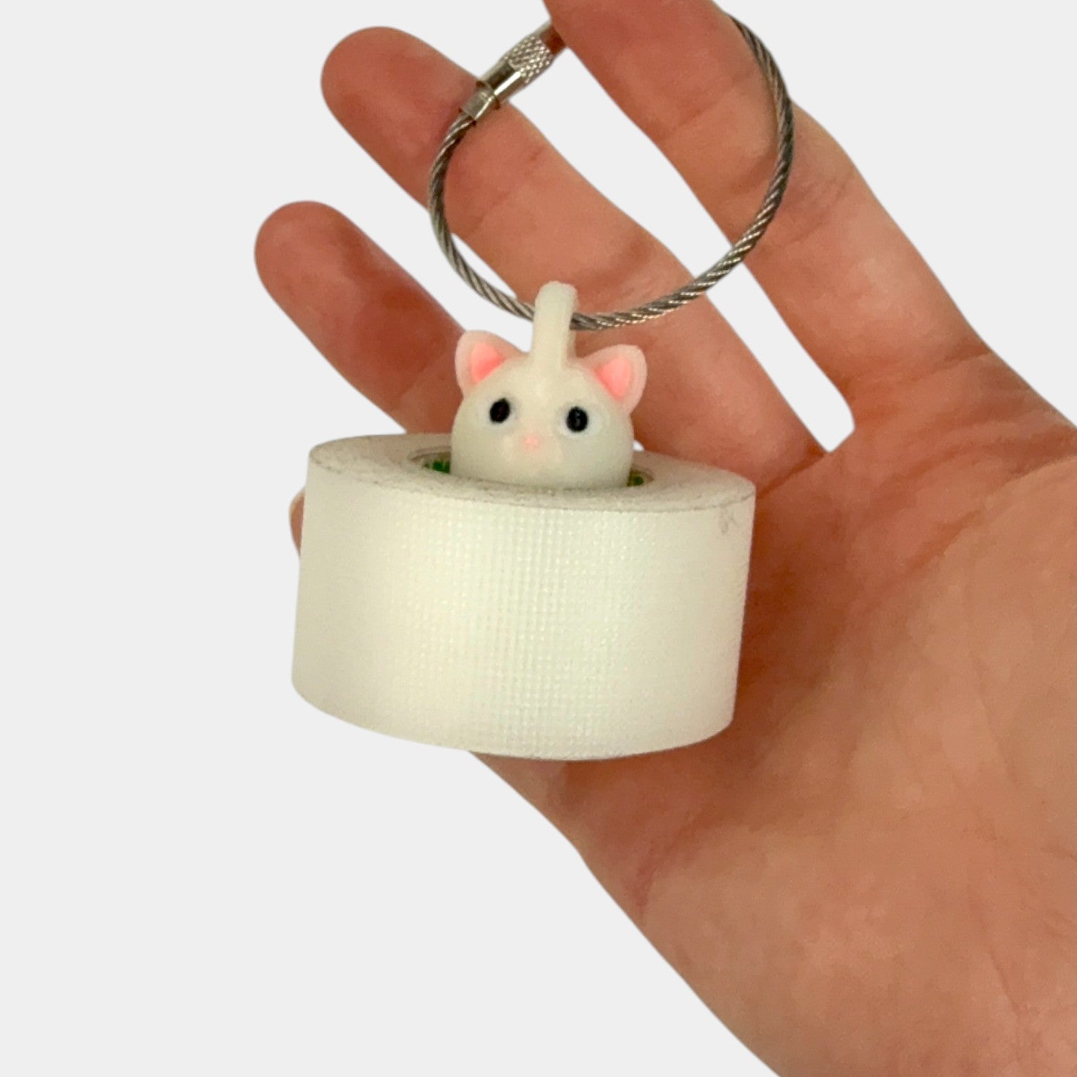 a compact white glow cat roll holder to hold and tape and coban for EMS, paramedics, EMT's, nurses, flightmed, vetmed, and athletic trainers