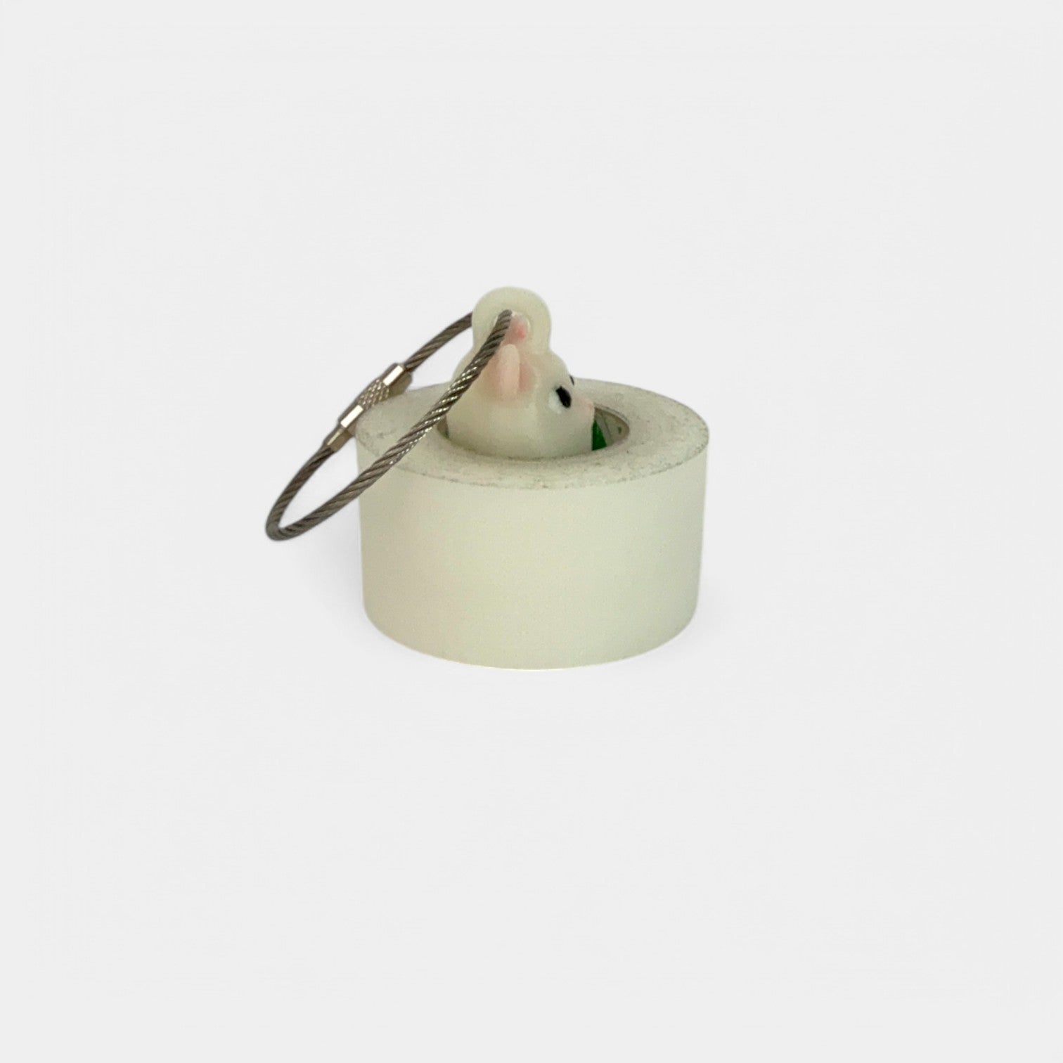 a compact white glow cat roll holder to hold and tape and coban for EMS, paramedics, EMT's, nurses, flightmed, vetmed, and athletic trainers